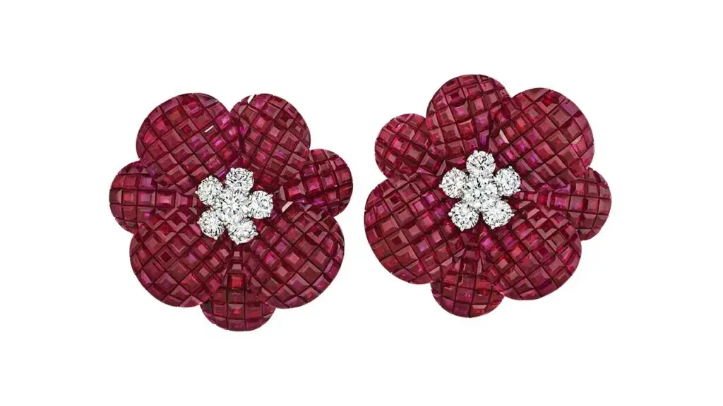 Pair of ruby and diamond flower earrings at Christie's image