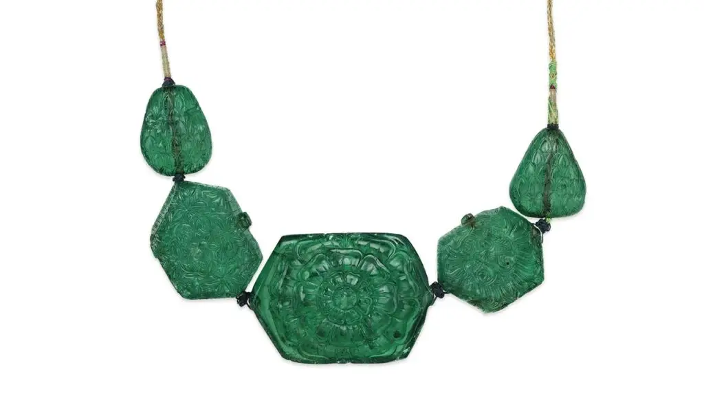 Necklace featuring five carved Colombian emeralds from the Mughal collection at Christie's image
