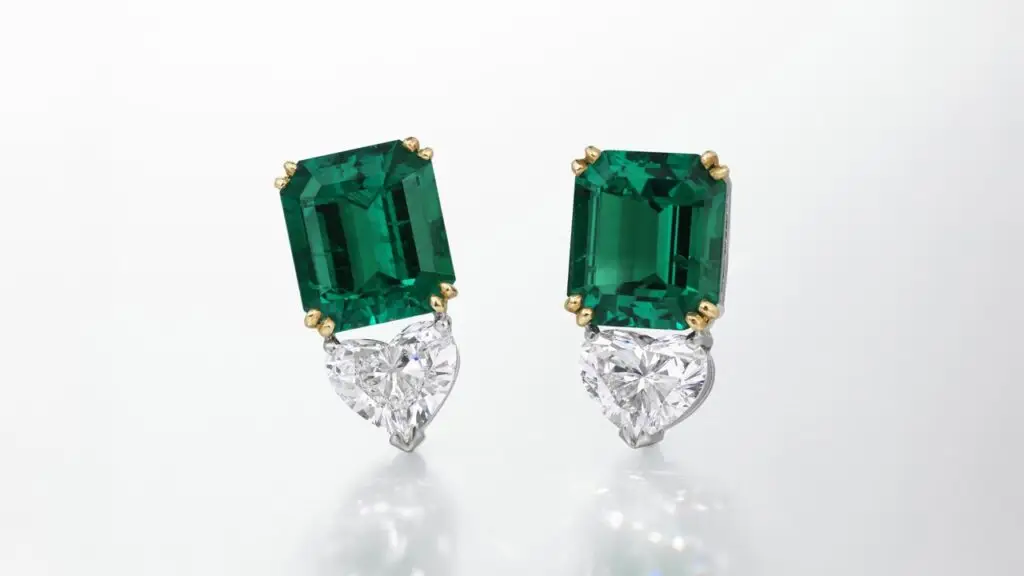 Earrings featuring octagonal step-cut Colombian emeralds, as well as heart brilliant-cut internally flawless diamonds at Christie's image