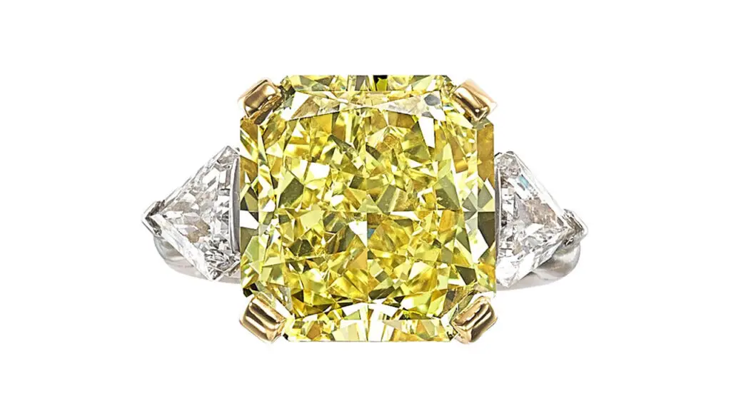 Ring featuring a cut-cornered fancy-intense-yellow diamond flanked by calf’s head-cut diamonds at Heritage Auctions image