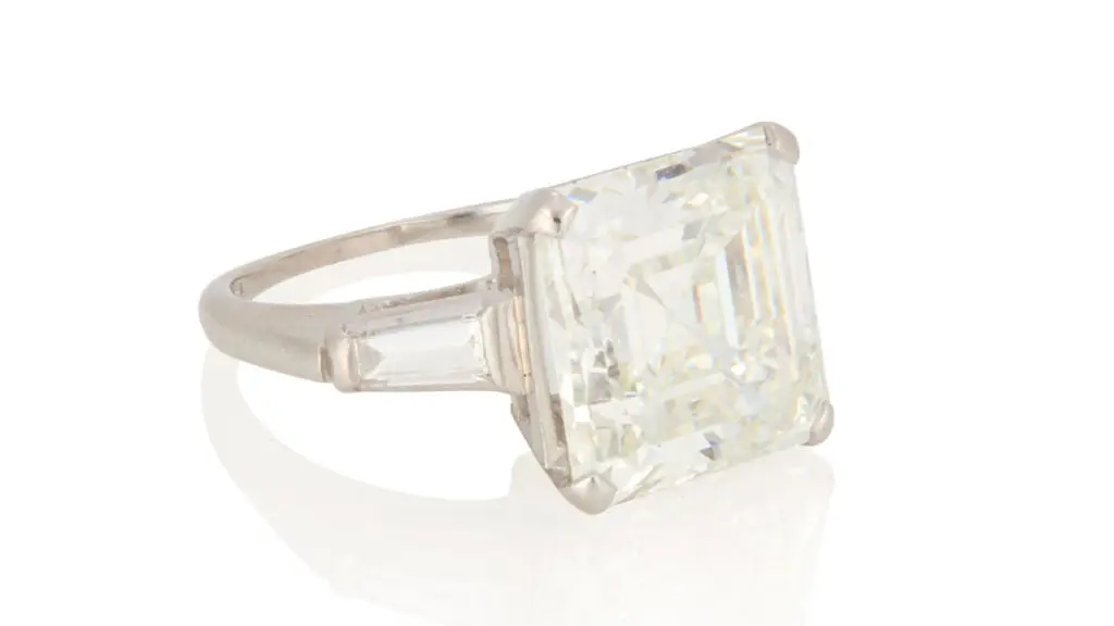 Ring with a square emerald-cut, 6.49-carat diamond flanked by two tapered baguette diamonds at John Moran image