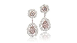The pair of colored-diamond earrings at Sotheby's image