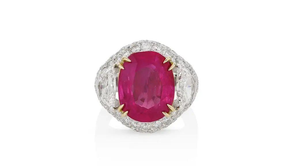 Ring with a 10.59-carat Burmese ruby in a diamond surround at Phillips image