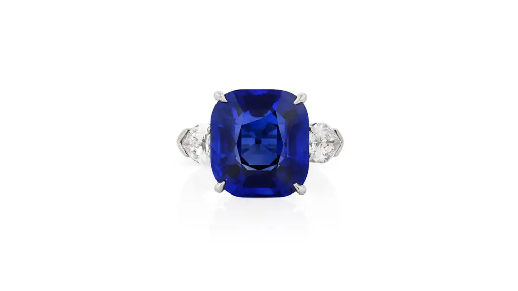 Graff ring bearing a Burmese sapphire flanked by diamonds at Phillips image