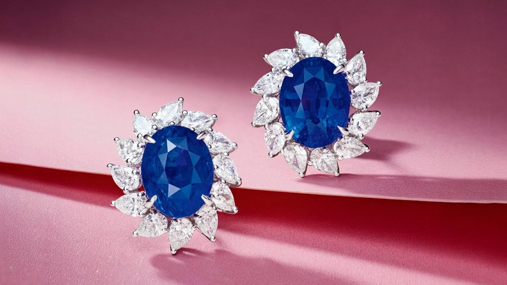 A pair of earrings centering oval-cut, 8.11- and 9.08-carat Sri Lankan sapphires, with pear-shaped diamond frames at Poly Auction image
