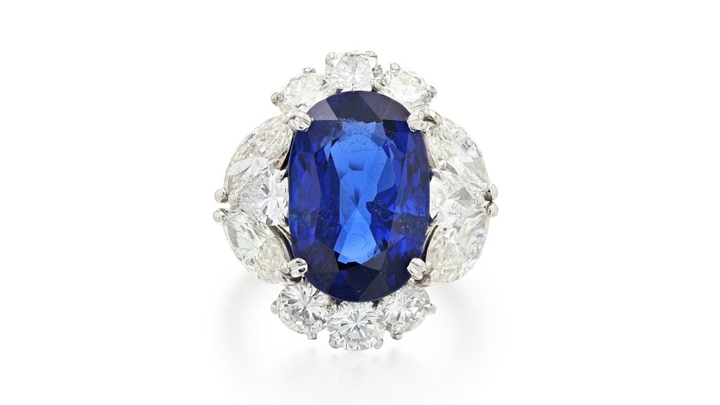 A ring centering an oval-shaped, 9.41-carat Burmese sapphire, in a frame of marquise-, pear- and brilliant-cut diamonds totaling an estimated 5 carats at Sotheby's image