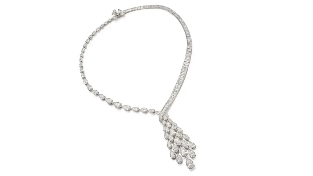 This Graff necklace is designed as ribbons of graduated pear-shaped and baguette diamonds, supporting a tassel of pear-shaped diamonds, with stones weighing between 0.90 and 3.01 carats by Sotheby's image
