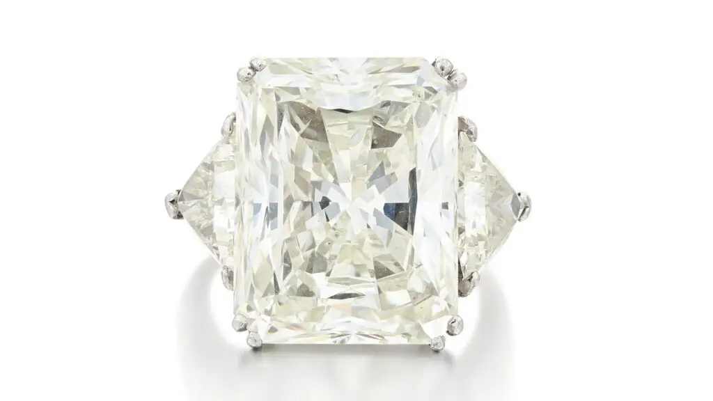 A ring containing a cut-cornered rectangular modified brilliant, 16.98-carat diamond by Sotheby's image