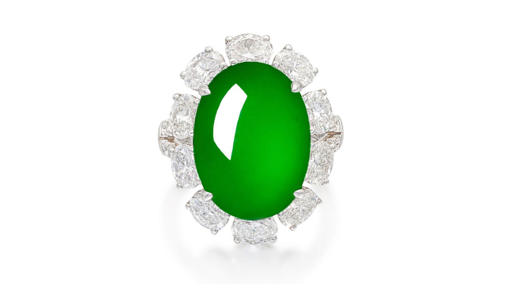 This ring features an oval jadeite cabochon within a surround of oval-shaped diamonds image
