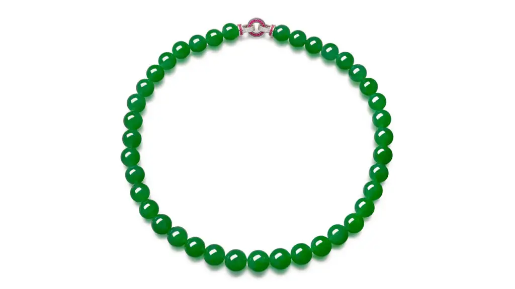 This necklace containing 39 translucent jadeite beads connected by a calibré-cut ruby, baguette and brilliant-cut diamond clasp at Sotheby's image