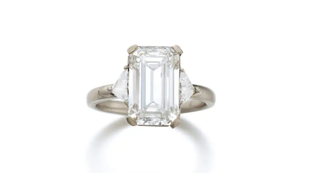 Step-cut with triangular diamonds ring at Sotheby's image