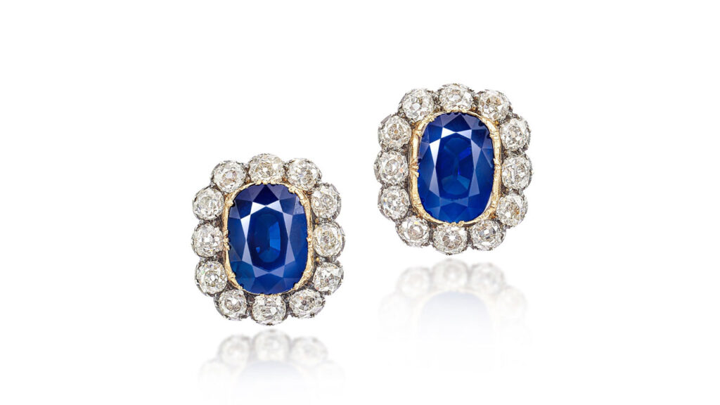 Pair of earrings, with cushion-shaped, Kashmir sapphires within an old European-cut diamond surround at Sotheby's image