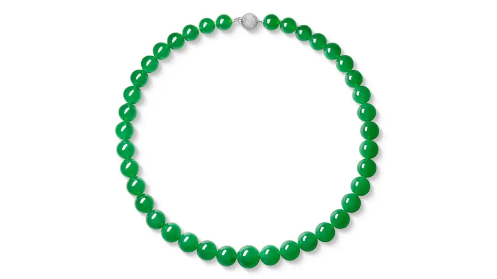 This necklace comprises 39 graduated intense-green jadeite beads, connected by a boule clasp featuring brilliant-cut diamonds at Sotheby's image