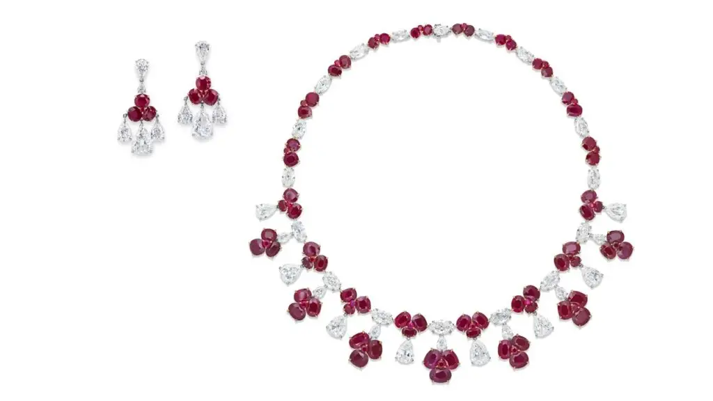 Necklace and earrings set, with oval and antique cushion brilliant-cut Burmese rubies and variously cut diamonds at Christie's image