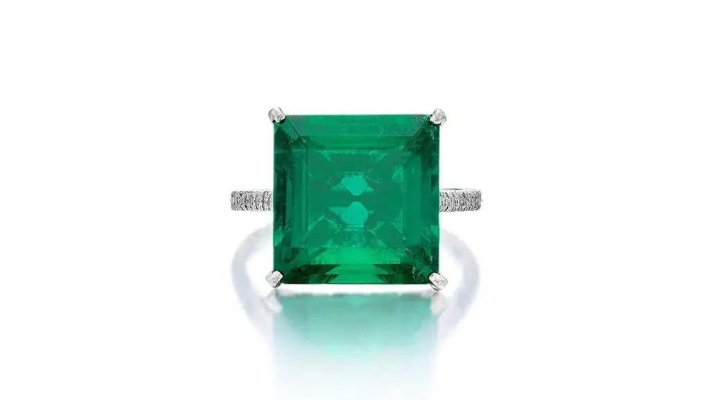 JCR ring containing a square emerald-cut Colombian emerald and a mounting pavé set with single-cut diamonds at Sotheby's image