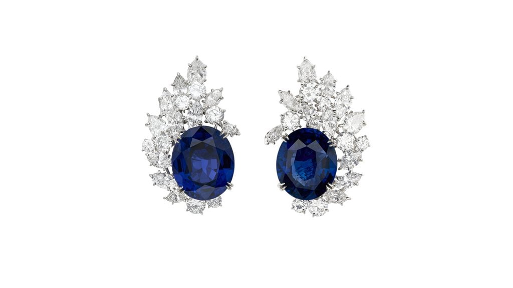 This Van Cleef & Arpels piece is a pair of earrings comprising oval sapphires weighing 18.99 and 20.60 carats in a diamond surround at Christie's image