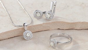 White gold ring, necklace and earrings with diamonds image