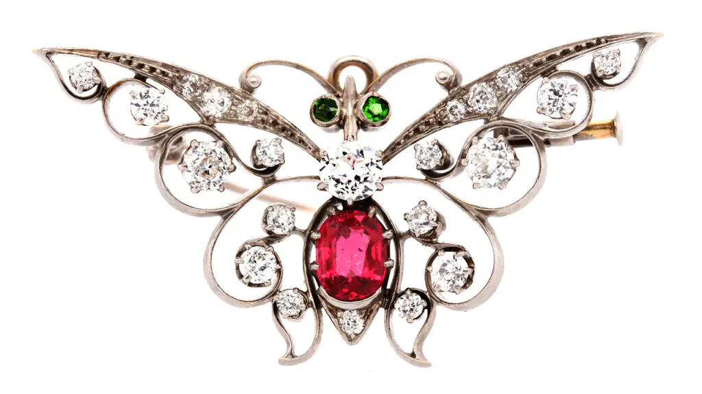 Edwardian butterfly brooch/ pendant with diamonds, spinel and garnets image