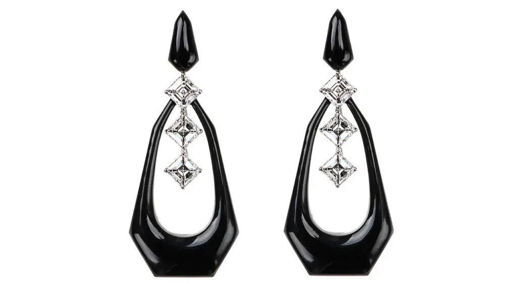 Earrings from Nikos Koulis’s Oui collection in black enamel, white gold and diamonds image
