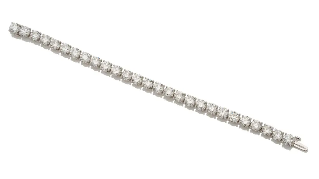 A bracelet featuring a single row of 27 round brilliant-cut diamonds weighing a combined 24.31 carats at Bonhams image
