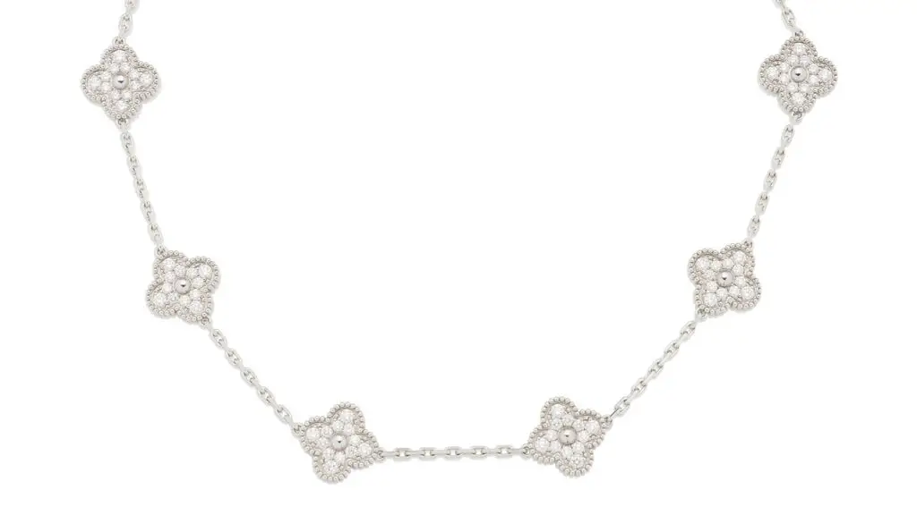 A Van Cleef & Arpels Alhambra necklace comprises 10 quatrefoil motifs with brilliant-cut diamonds, each separated by a linked chain. The diamonds weigh approximately 4 carats in total at Bonhams image