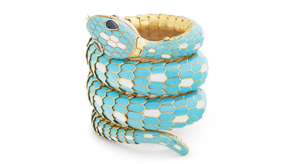 This Bulgari Serpenti bracelet watch circa 1965 features blue and white enamel and pear-shaped sapphire eyes. The dial is signed Vacheron Constantin at Christie's image