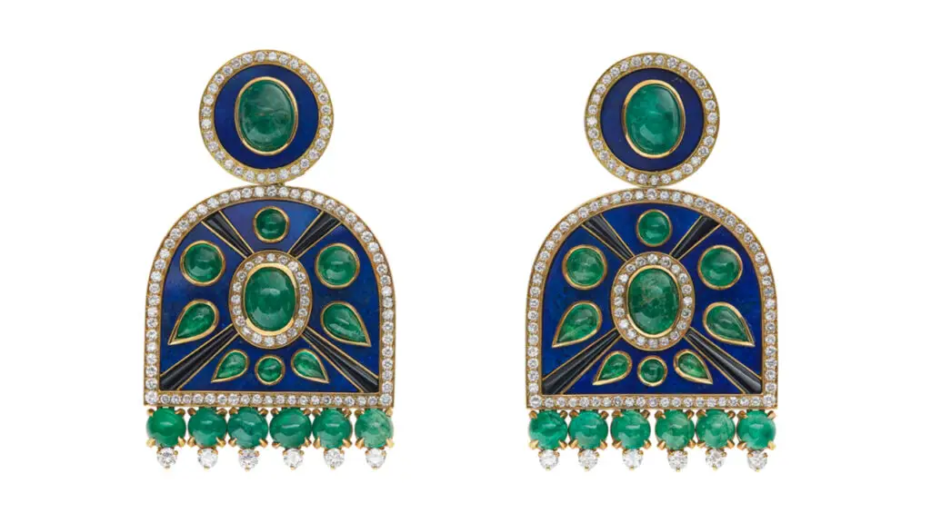 A pair of Bulgari earrings with around 24.50 carats of oval, round and pear-shaped cabochon emeralds, 5 carats of round diamonds, rod-shaped onyx and lapis lazuli panels at Christie's image