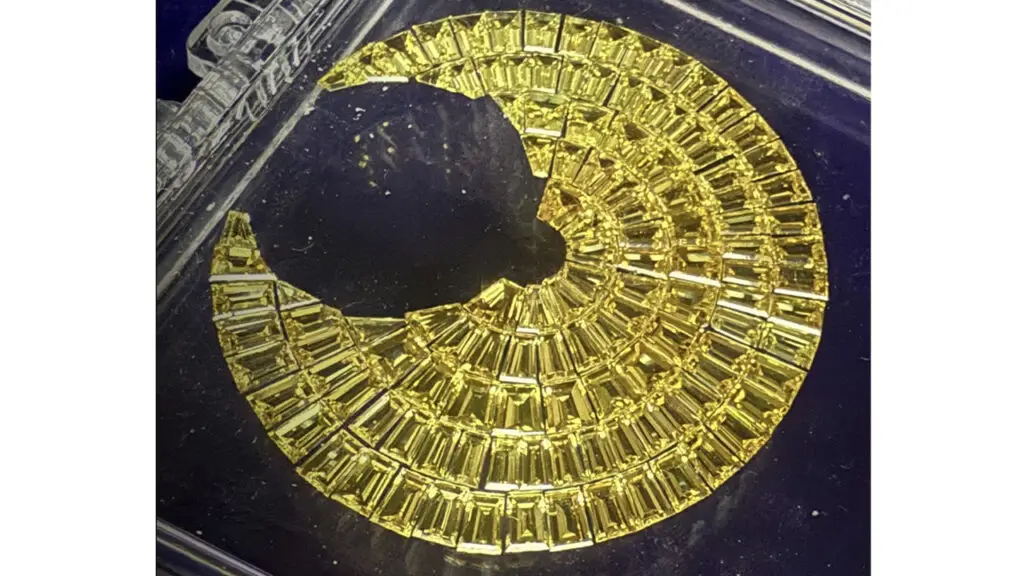 A yellow-sapphire watch dial by Bali Diamonds image