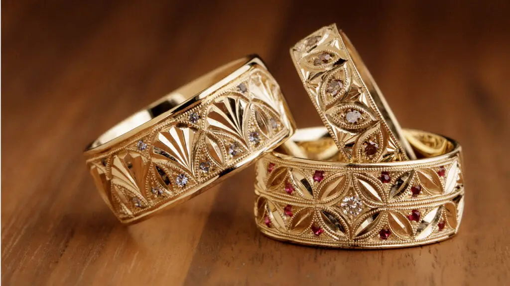 A selection of hand-engraved rings in 14-karat gold image
