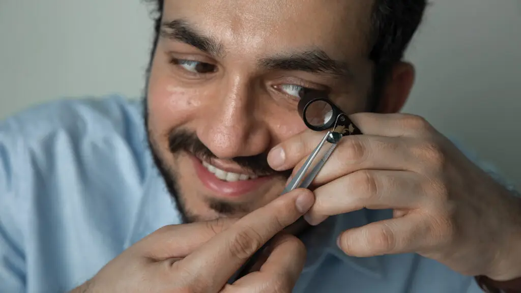 Navneet Agarwal inspecting a gemstone image