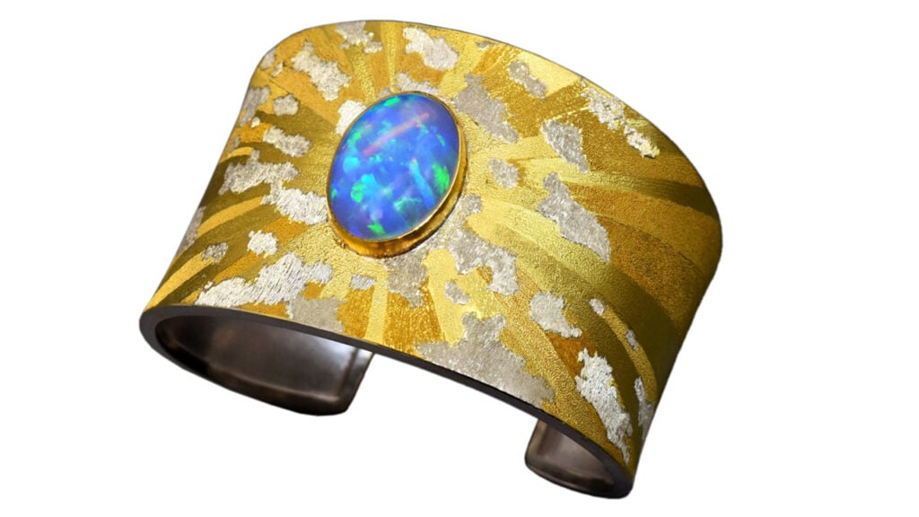 Opal in the Sky – Rainbow in the Clouds cuff in gold and silver with an Ethiopian opal image