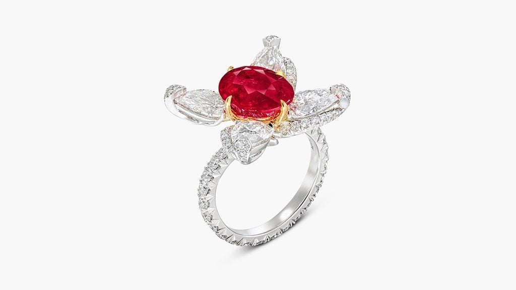 A ring with an oval, 5.06-carat Burmese ruby in a pear-shaped and brilliant-cut diamond surround. at Sotheby's image
