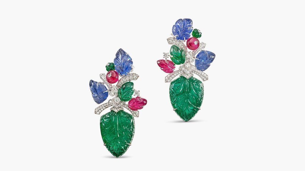 A pair of Cartier tutti frutti earrings with carved rubies, sapphires and emeralds, as well as brilliant-cut diamonds at Sotheby's image