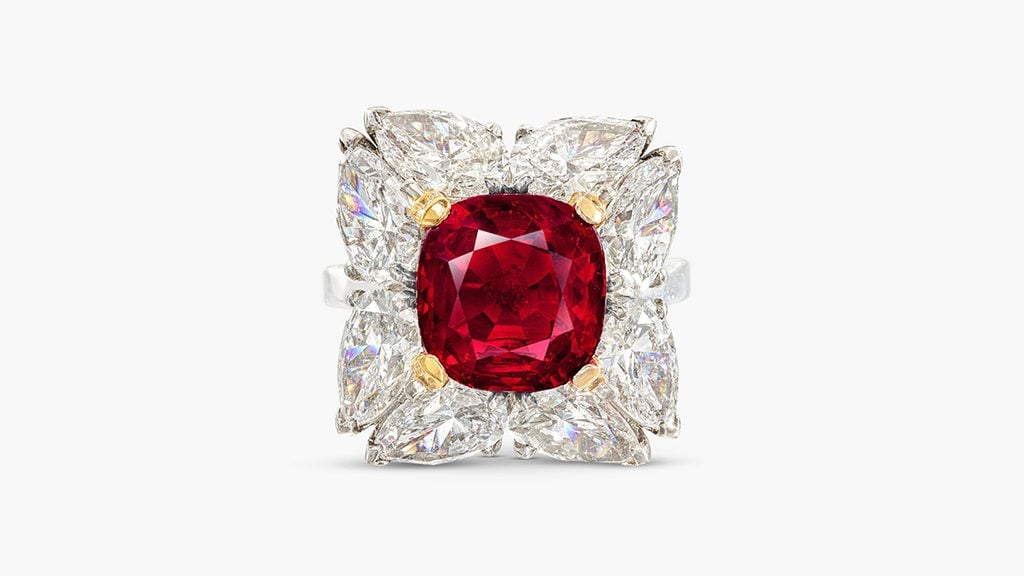 This ring contains a cushion-shaped, 6.05-carat Burmese ruby in a pear-shaped diamond frame at Sotheby's image
