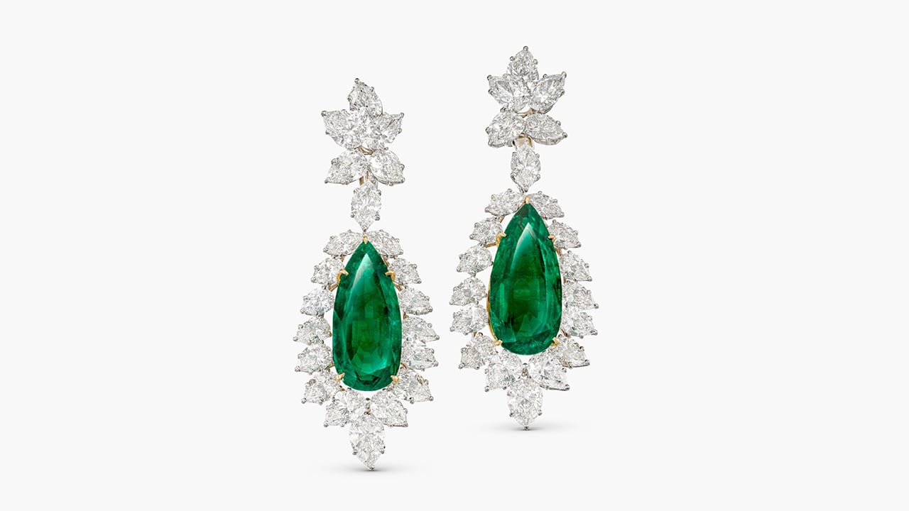 Harry Winston designed these earrings bearing two pear-shaped Colombian emeralds weighing 17.03 and 16.27 carats in a diamond surround at Sotheby's image
