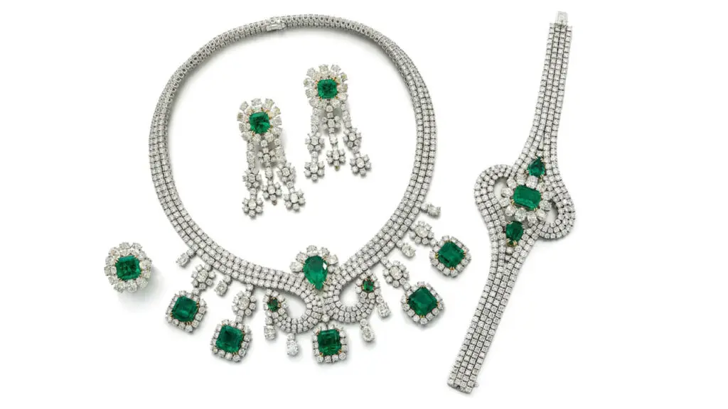 Parure comprising a necklace, earrings, a bracelet and a ring, all with Colombian emeralds and diamonds at Sotheby's image