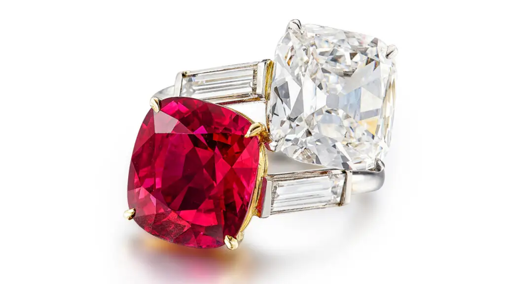 Cushion-shaped ruby and a round-cornered square diamond ring by Cartier image
