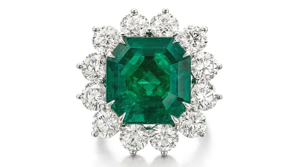 Colombian emerald with a surround of brilliant-cut diamonds ring image