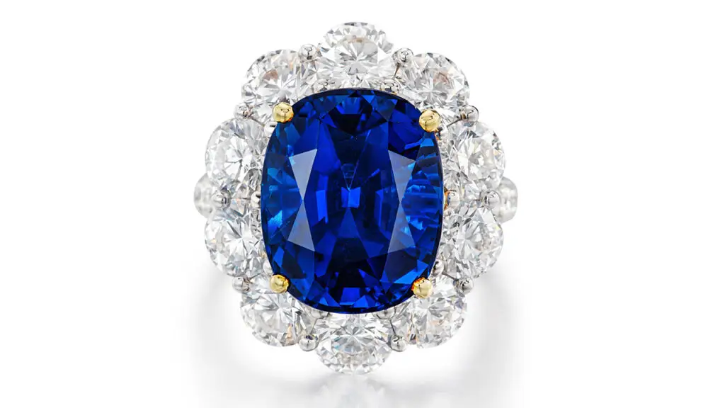 Cushion-shaped Burmese sapphire surrounded by brilliant-cut diamonds ring image