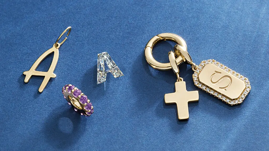 Gold, diamond and gem charms image