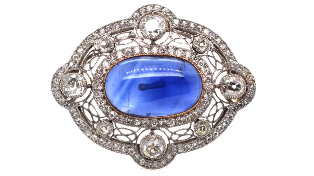 A sapphire and diamond brooch at Under the Crown image