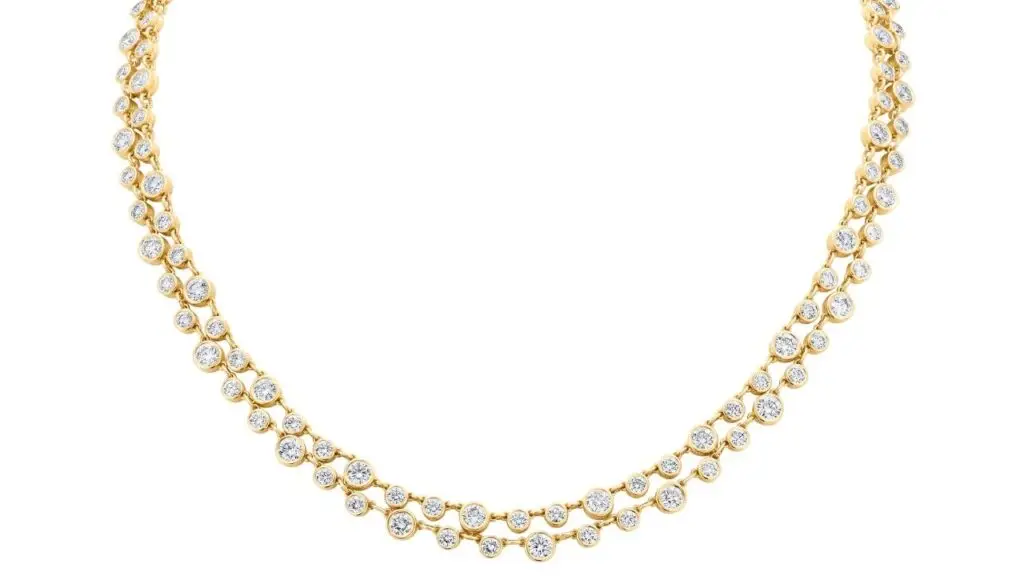 A diamond line necklace in 18-karat yellow gold image