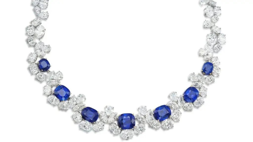 Oval-shaped diamonds, interspersed with pear- and marquise-shaped diamonds and seven cushion-cut Kashmir sapphires ranging from 2.40 to 11.37 carats necklace image.
