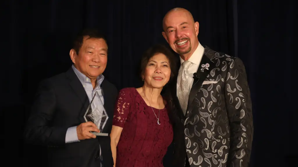 From left: Ben and Molly Kho of Ben Kho Gems with celebrity stylist Michael O’Connor at the AGTA Spectrum Awards Gala 2025 image