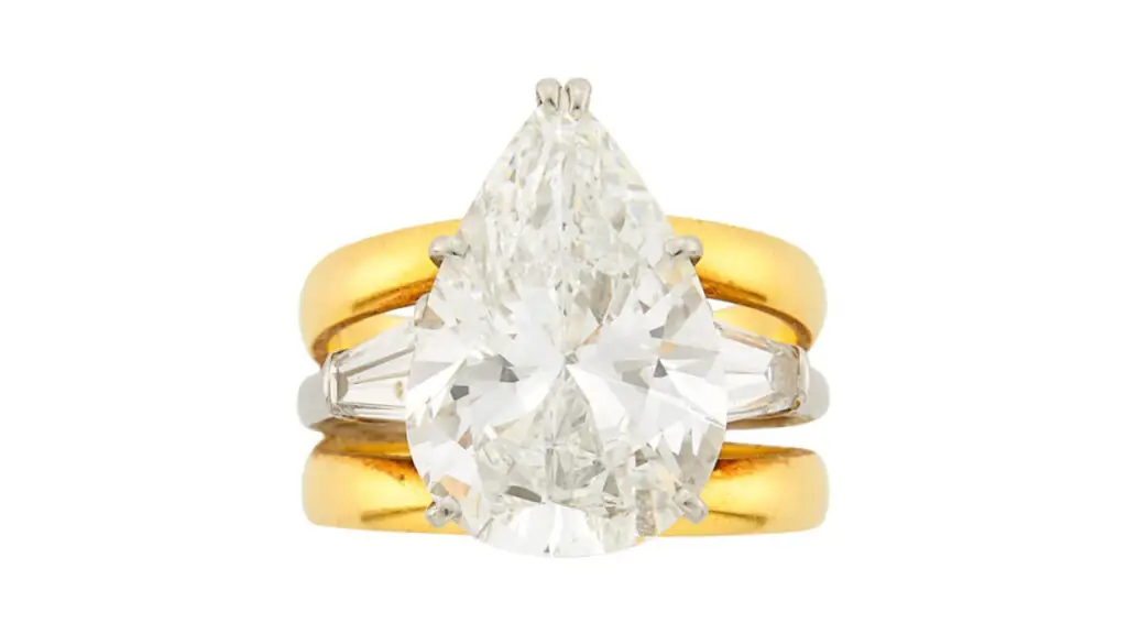 Harry Winston ring bearing a pear-shaped diamond set between two tapered baguette diamonds at Doyle image
