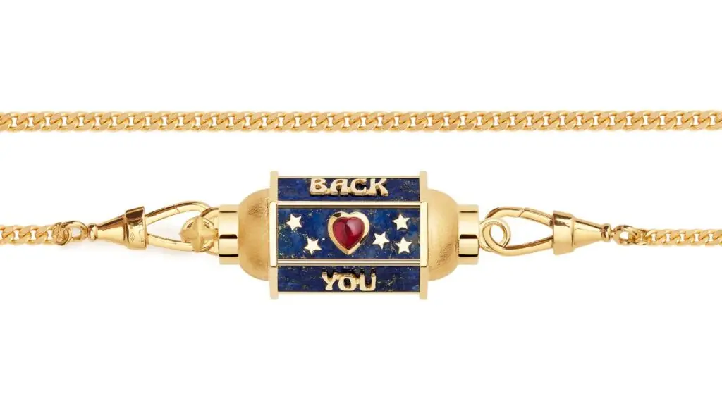 Marie Lichtenberg's Love You locket in lapis lazuli and gold with a ruby heart and moonstone image