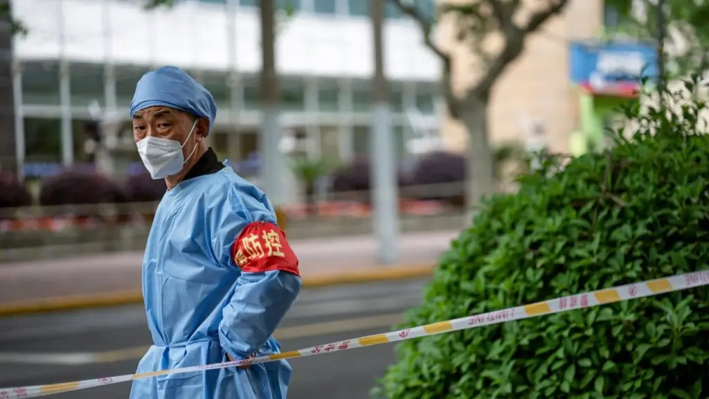 Man in mask in Shanghai China May 10 2022 during omicron lockdown credit Shutterstock 1280