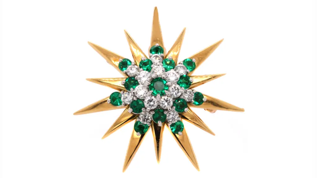 A gold, emerald and diamond Retro brooch image