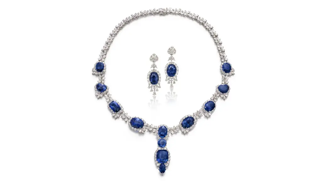 Matching pair of earrings and necklace with cushion- and heart-shaped sapphires and pear-, marquise- and round-shaped diamonds at Sotheby's image