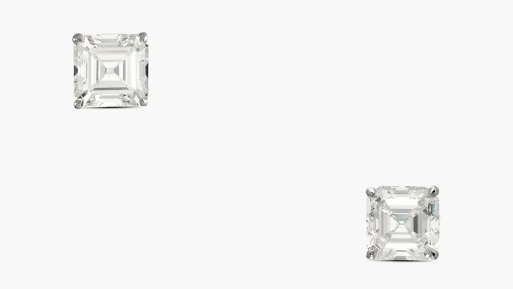 A pair of earrings bearing a square emerald-cut, 5.01-carat, J, VVS2 and a square emerald-cut, 5.02-carat, I, VVS1 diamond at Sotheby's image
